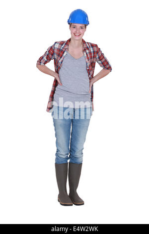 Full-length portrait of a smiling tradeswoman Stock Photo