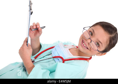 Young girl dressed up as a doctor Stock Photo