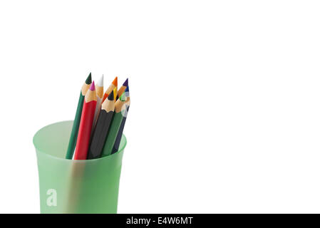 colored pencils for children in green glass Stock Photo