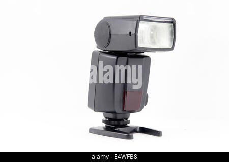 External flash standing in white isolated Stock Photo