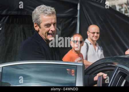 Cardiff, Wales, UK. 17th July, 2014. Peter Capaldi on the set of Doctor Who, filming on Queen Street, Cardiff Credit:  Owain Thomas Alamy Live News Stock Photo