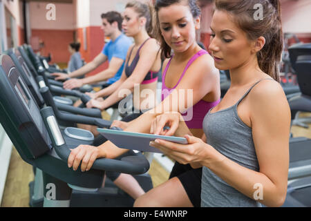 Instructor and woman in the gym Stock Photo
