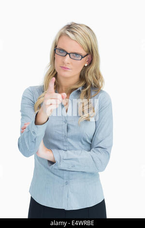 Strict woman pointing Stock Photo