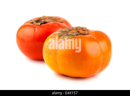 Two ripe persimmon fruits Stock Photo