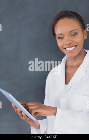 Teacher holding an ebook Stock Photo - Alamy