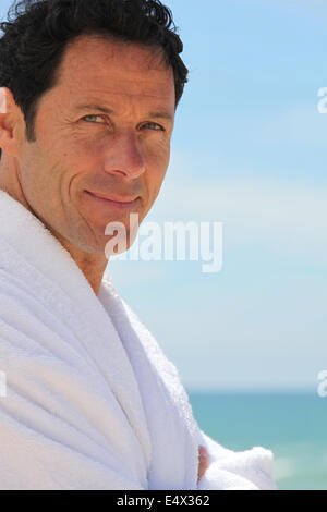 Man in bathrobe Stock Photo