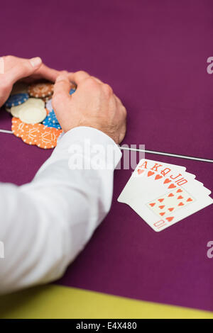 Man grabbing chips close-up Stock Photo