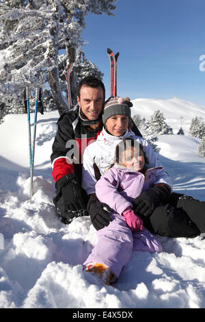 Family on a skiing holiday Stock Photo