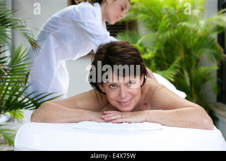 Mature woman having a massage Stock Photo