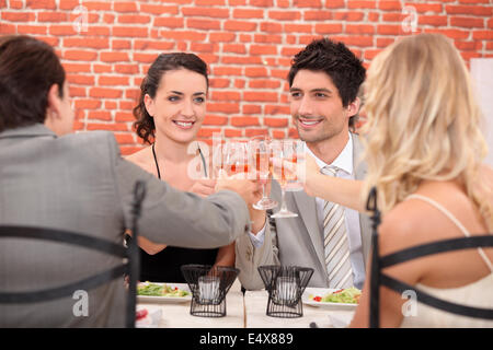 Friends having dinner together Stock Photo