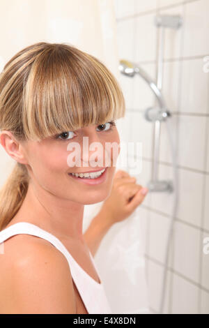 Blond teenager shower Stock Photo - Alamy