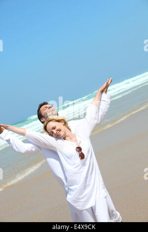 Couple on the beach Stock Photo