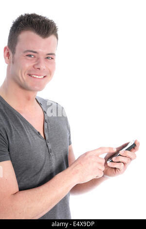 Smiling young man using a smartphone Stock Photo