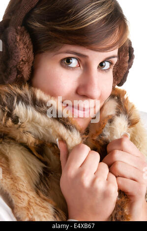 Cold Woman Snuggling in Warm Coat Stock Photo