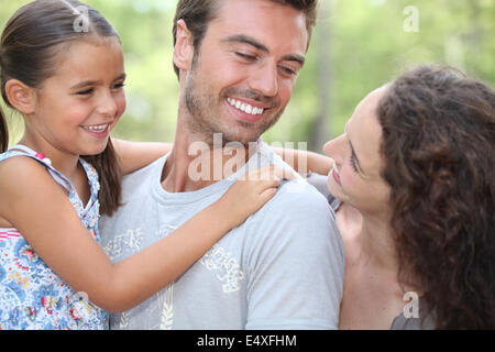 Family enjoying day out at the park Stock Photo