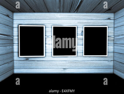 photo frames on the wooden wall. Stock Photo