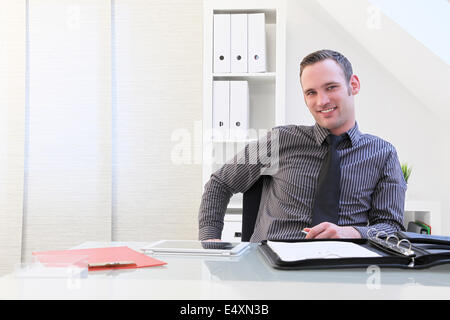 Smiling successful young businessman Stock Photo