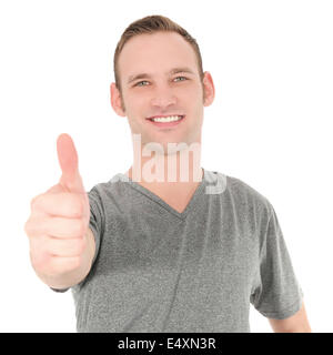 Smiling man showing thumb up Stock Photo