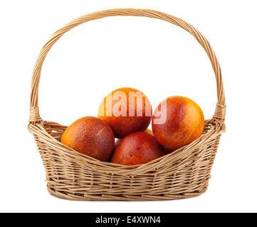 Blood red oranges in wicker basket Stock Photo