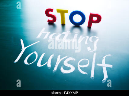 Stop hating yourself concept Stock Photo