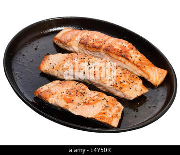 Fried Salmon Fillets In A Iron  Platter Isolated On White Background Stock Photo