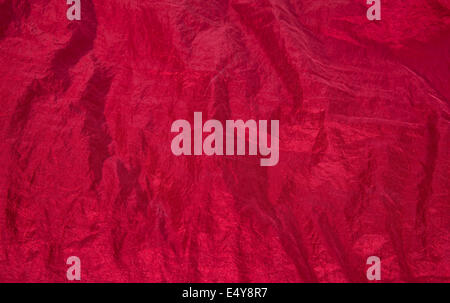 Shiny red fabric taffeta background Stock Photo