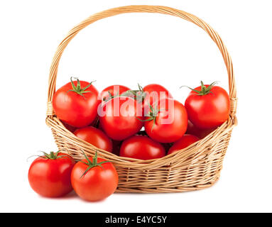 Fresh red tomatoes in wicker basket Stock Photo