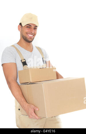 Confident young man carrying cardboard boxes Stock Photo