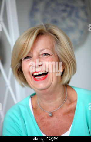 Laughing vivacious senior woman Stock Photo