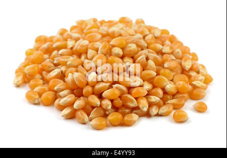 Heap of dry popcorn seeds isolated on white Stock Photo