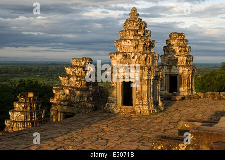 Phnom Bakheng Temple. Sunrise. Phnom Bakheng is located 1,30 meters (4,265 feet) north of Angkor Wat and 400 meters (1,312 feet) Stock Photo