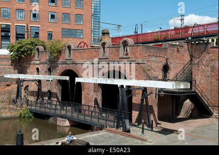 Site of The Grocer's Warehouse in Castlefield Urban Heritage Park and historic inner city canal conservation area, Manchester. Stock Photo