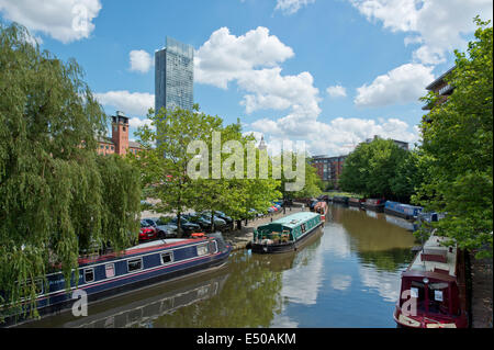 The Castlefield Urban Heritage Park and historic inner city canal conservation area including Beetham Tower in Manchester, UK. Stock Photo