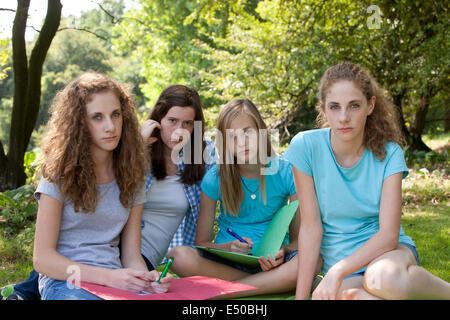 Group of sombre young teenagers Stock Photo