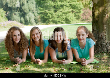 College friends enjoy a day in the park Stock Photo