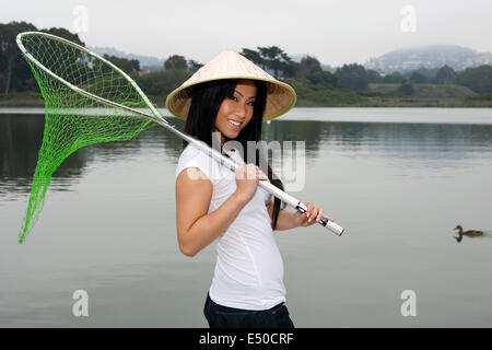 Beautiful Woman Cap Fishing While Sitting Stock Photo 1179152083