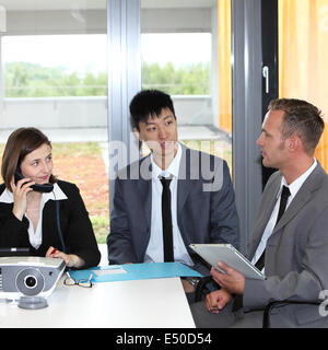 Business colleagues having a discussion Stock Photo