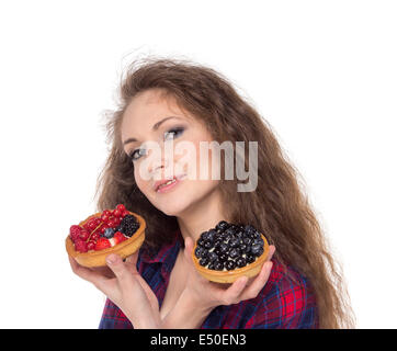 Difficult choice between two cakes Stock Photo