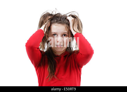 Disheveled frightened girl child Stock Photo