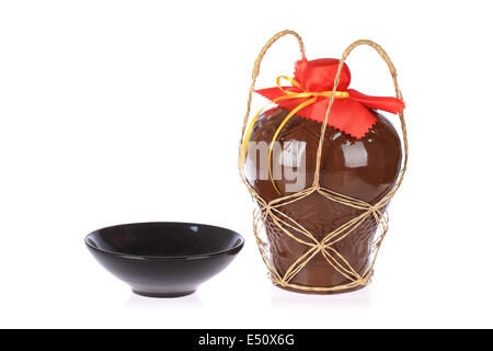 rice wine jar and ceramic bowl Stock Photo