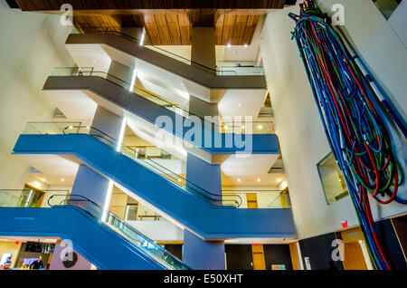 escalators side view in modern building Stock Photo