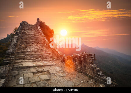 the great wall ruins in sunrise Stock Photo