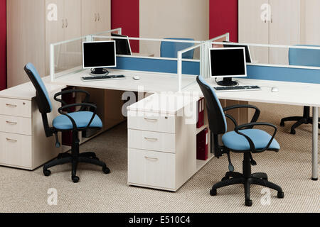 computers on the desks Stock Photo