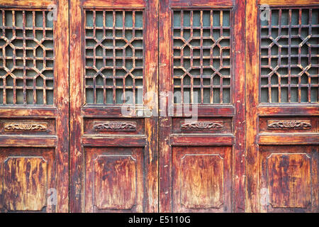 traditional wooden door with lattice window Stock Photo