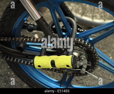 Padlock on wheel Stock Photo