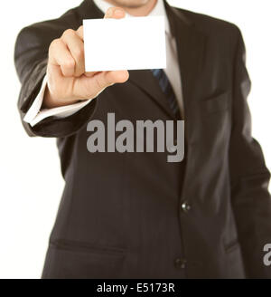 Business man handing a blank business card Stock Photo