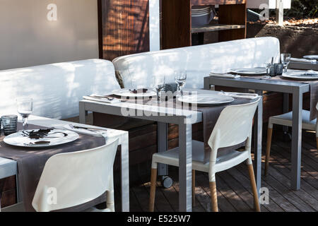 tables and chairs in a cafe Stock Photo