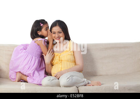 Daughter confiding in mother Stock Photo