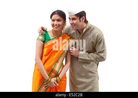 Maharashtrian couple looking at something Stock Photo