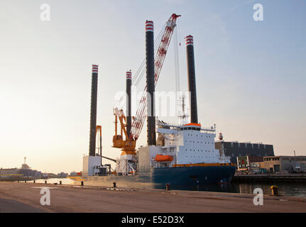 Transportation of a huge crane on a special ship Stock Photo